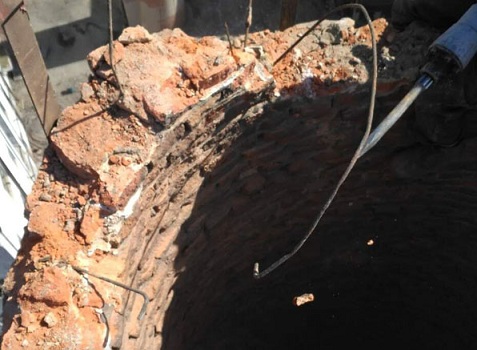 煙囪拆除施工前首先劃設(shè)好安全施工區(qū)域